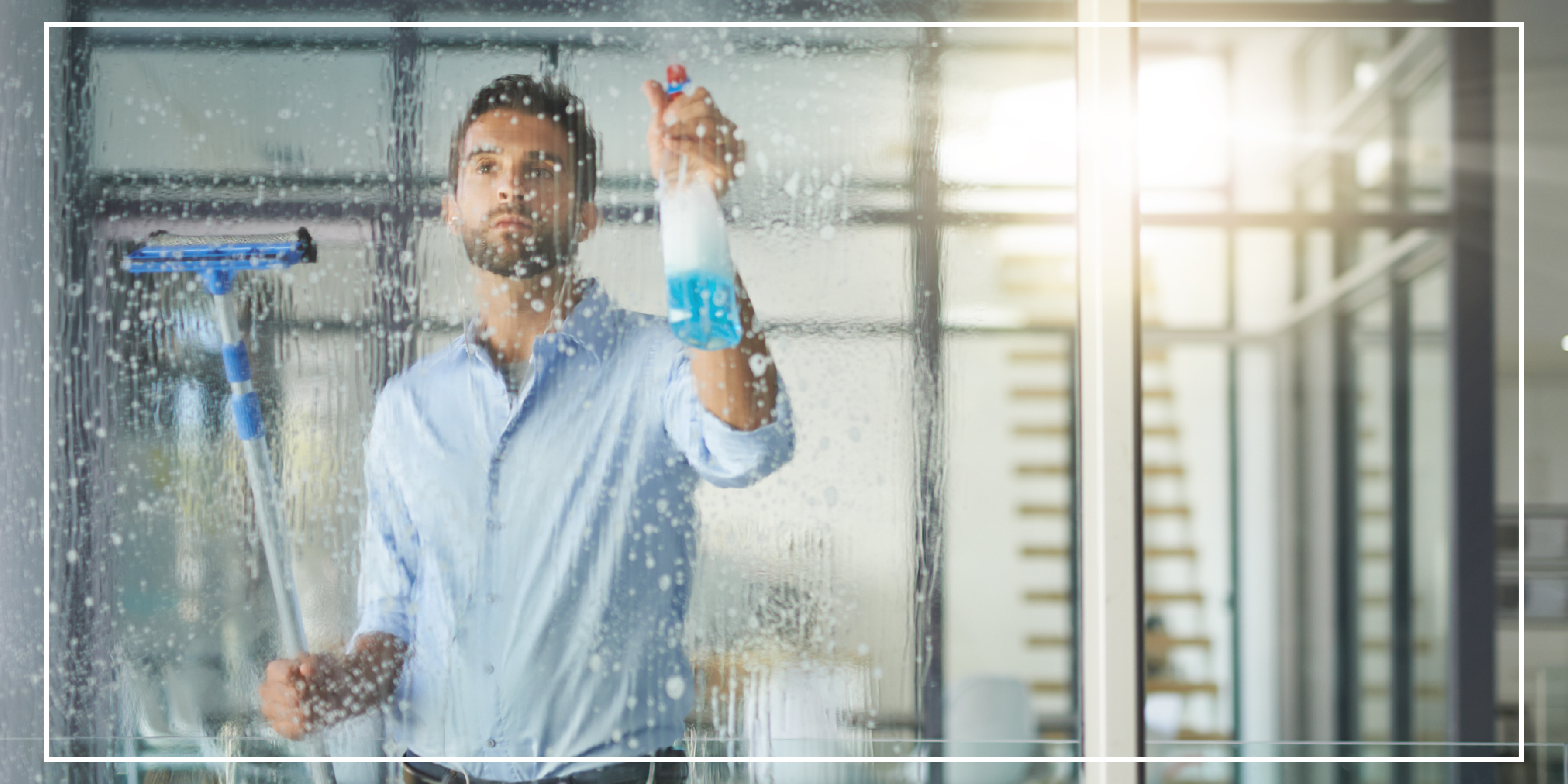 A man washing windows.