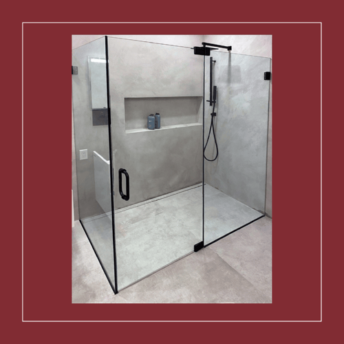 glass shower with marble wall and flooring