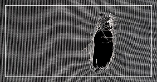a-torn-window-screen-that-needs-repair