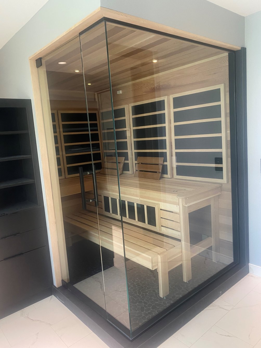 A home sauna in bathroom.