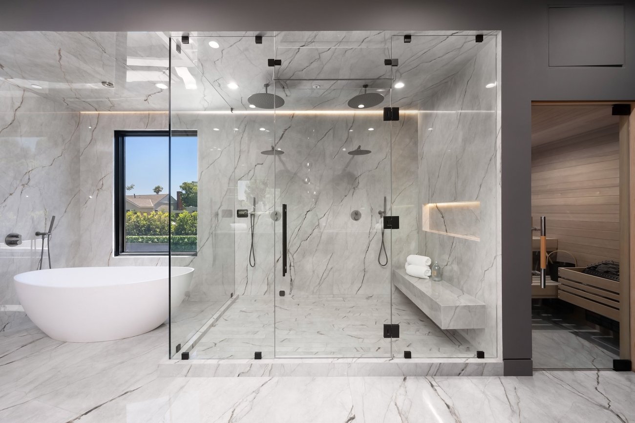 Custom frameless glass shower enclosure