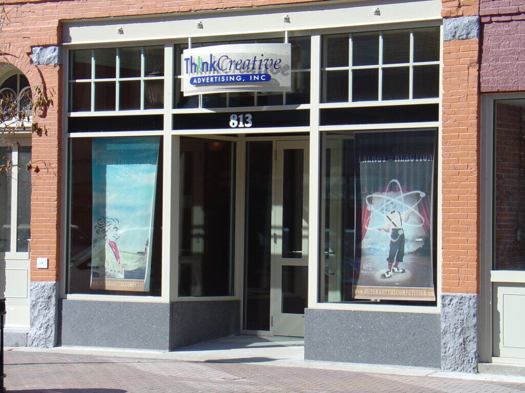 Think Creative display windows and glass door