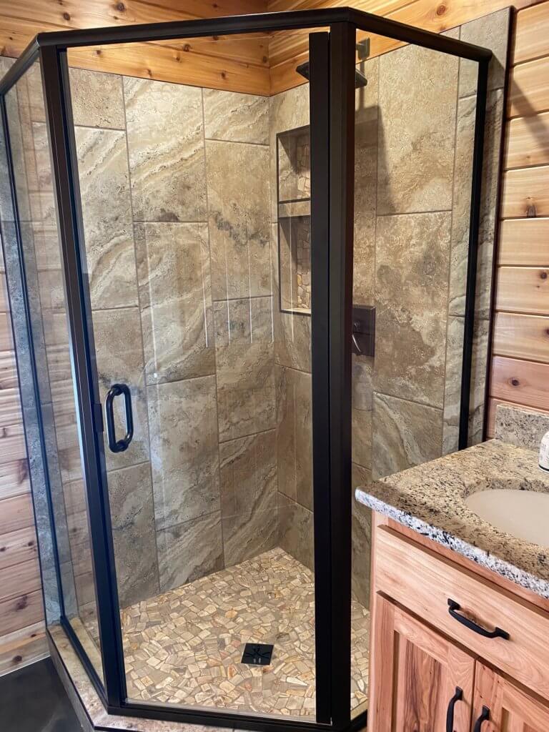 Glass shower enclosure