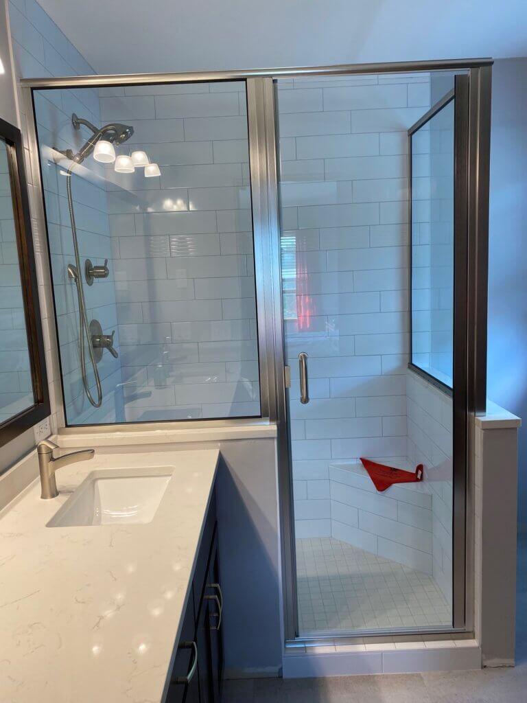 Glass shower enclosure