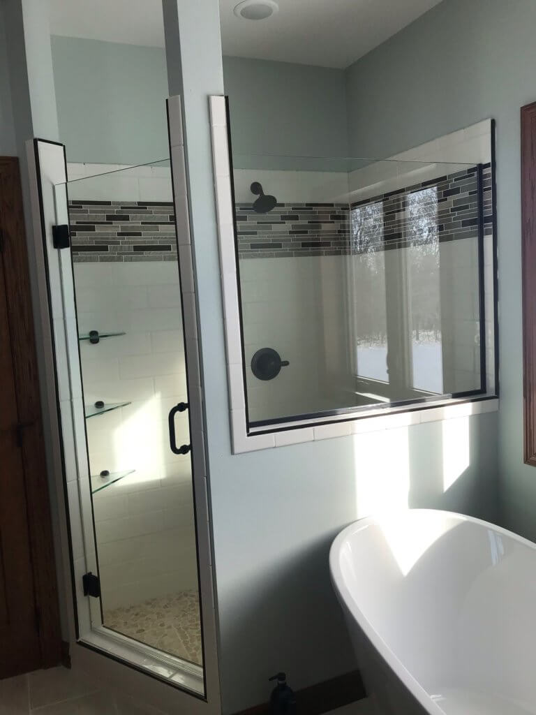 Glass shower enclosure