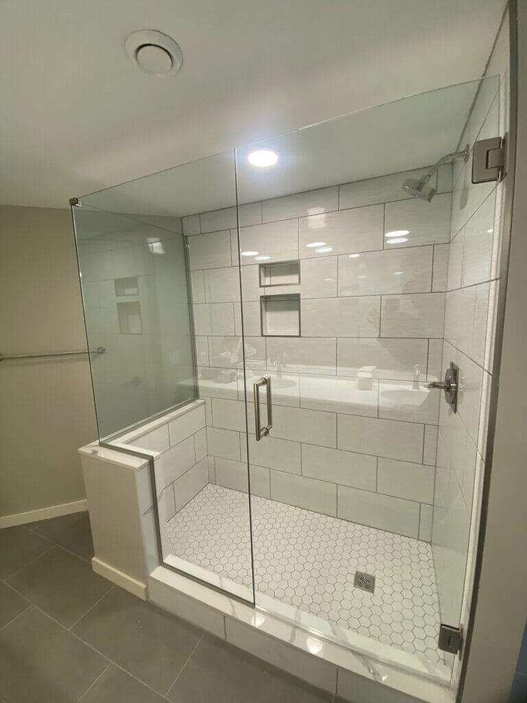 Glass shower enclosure
