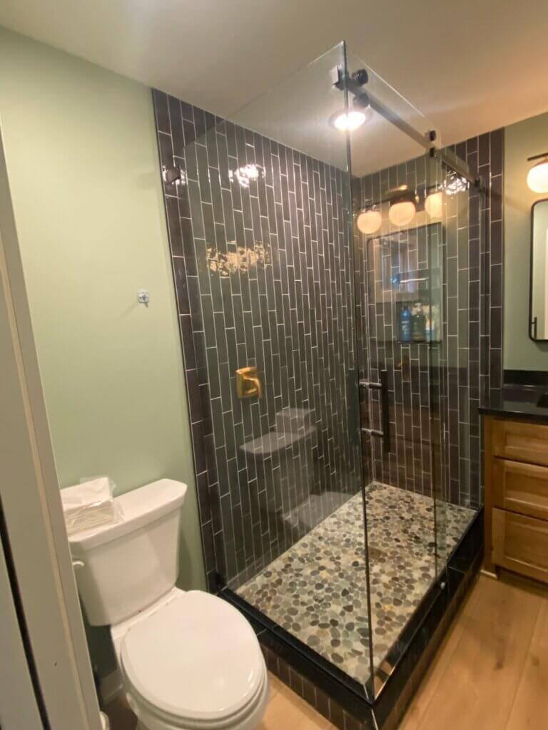 Glass shower enclosure