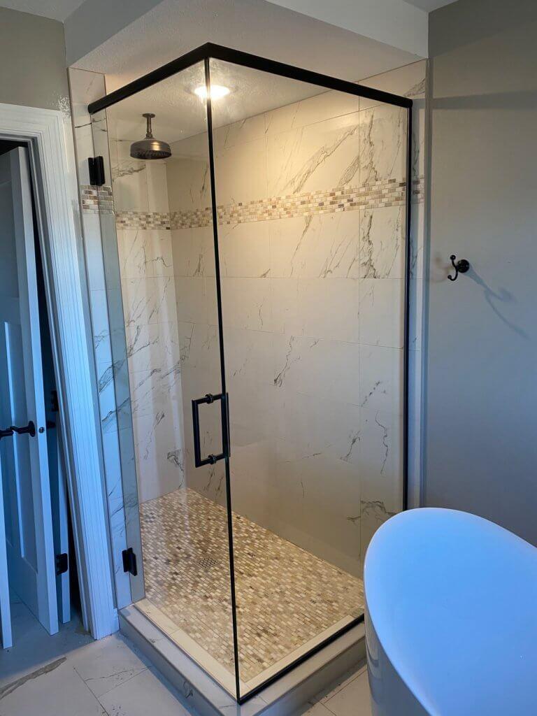 Glass shower enclosure