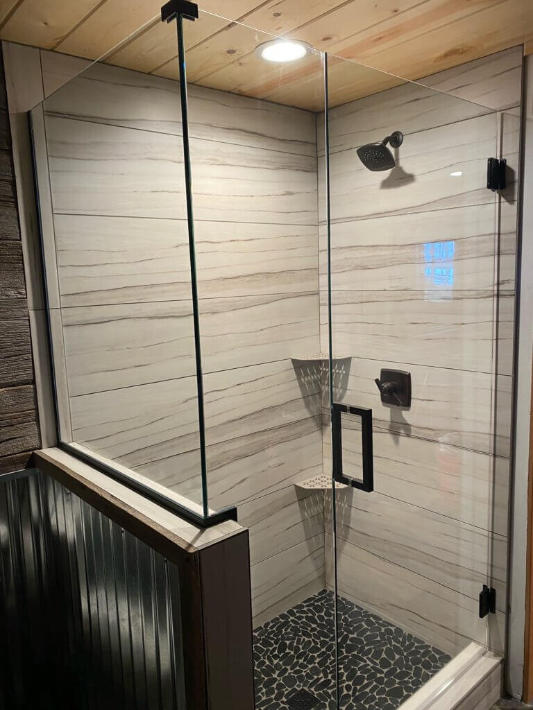 Glass shower enclosure