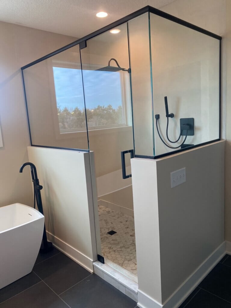 Glass shower enclosure