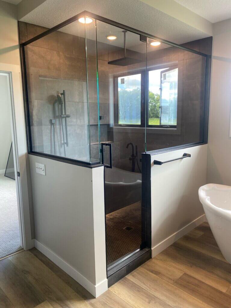 Glass shower enclosure