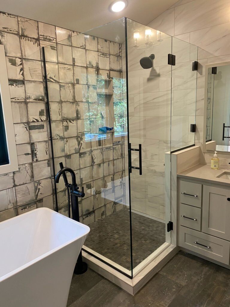 Glass shower enclosure