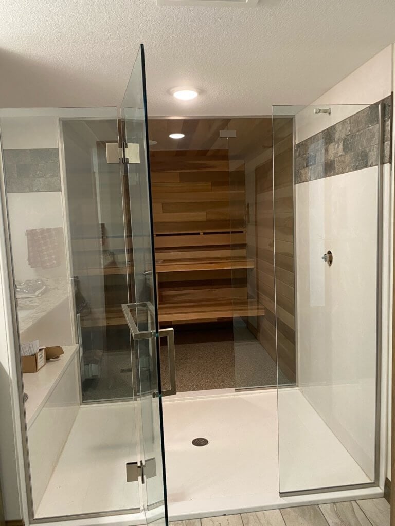Glass shower enclosure