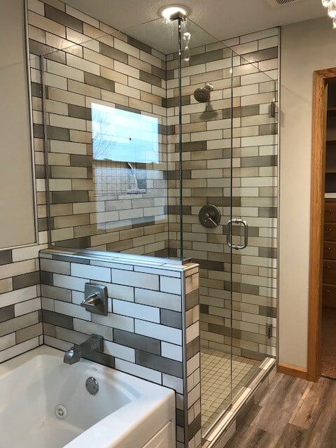 Glass shower enclosure