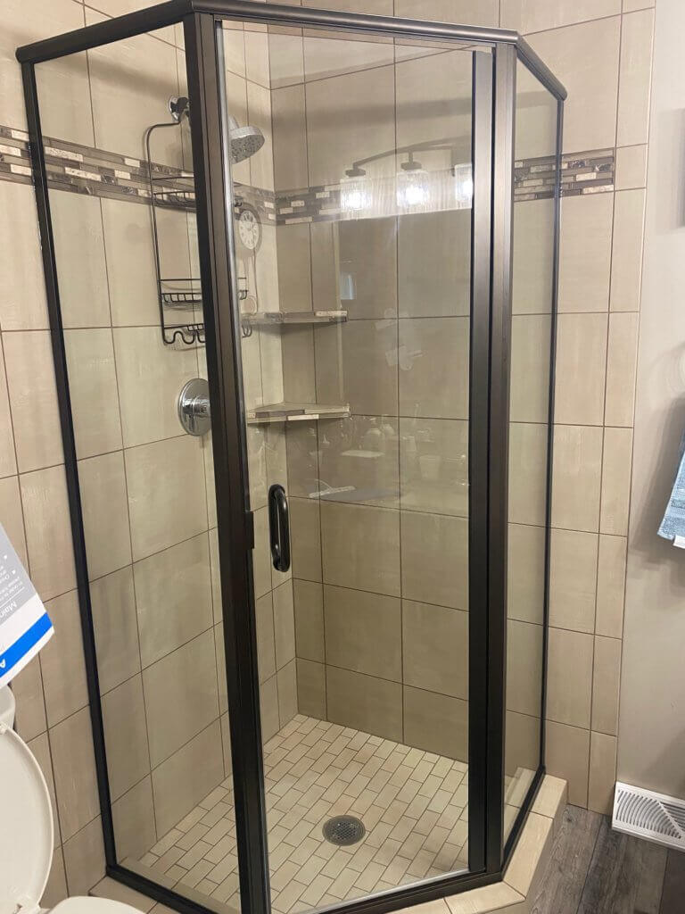 Glass shower enclosure