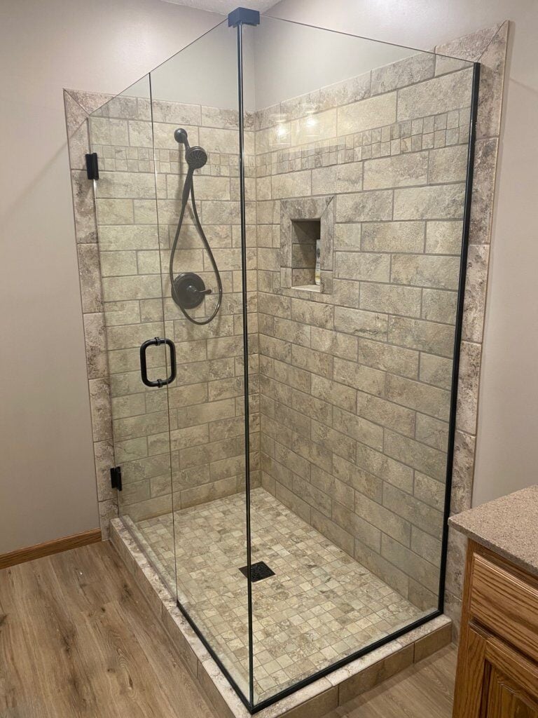 Glass shower enclosure