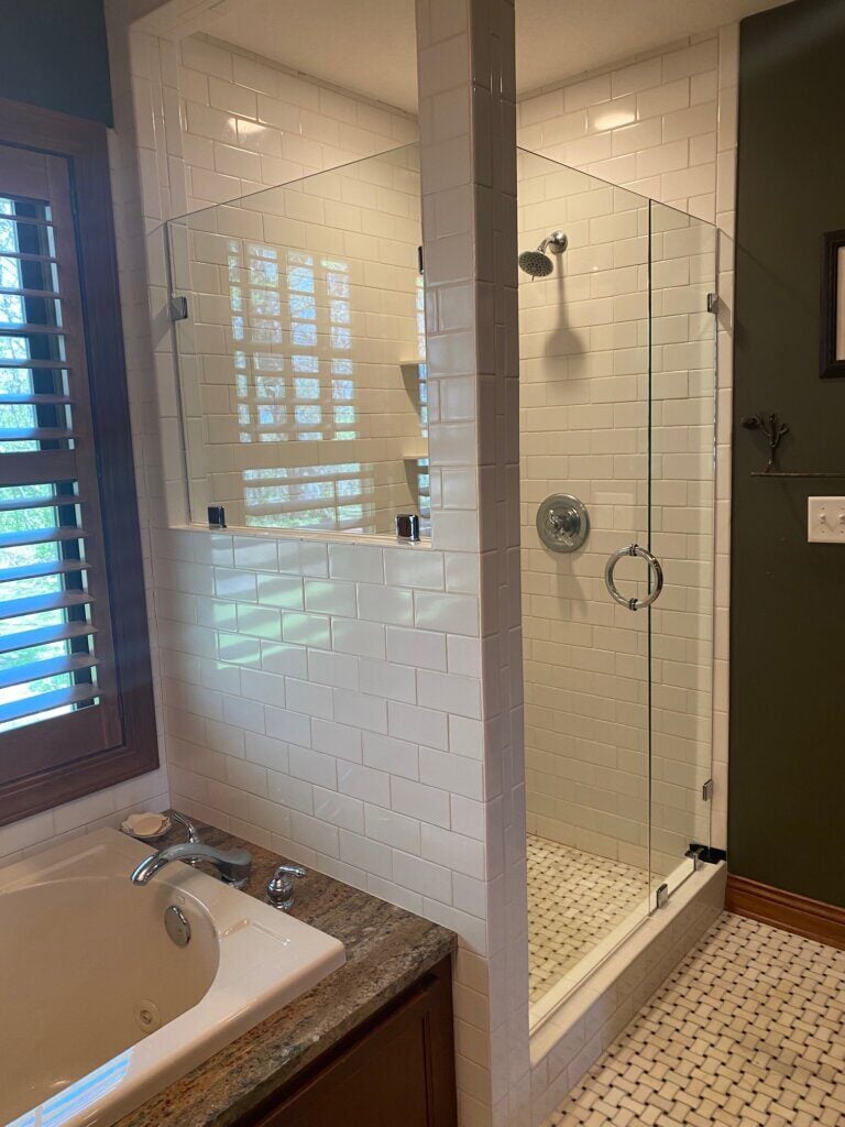 Glass shower enclosure