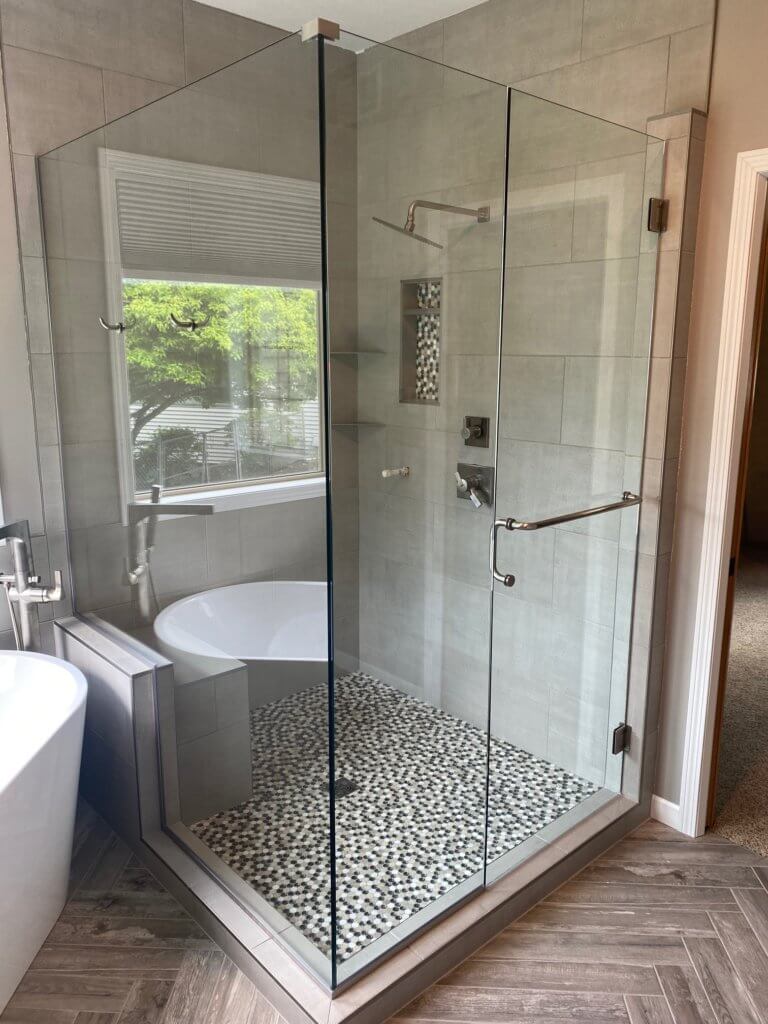 Glass shower enclosure