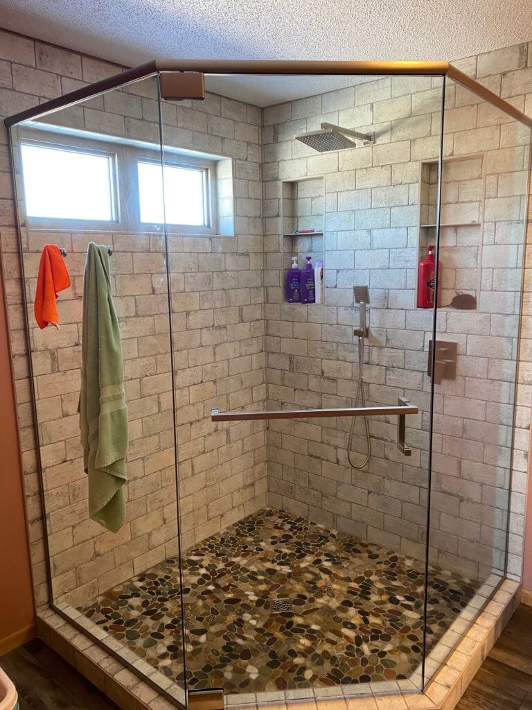 Glass shower enclosure
