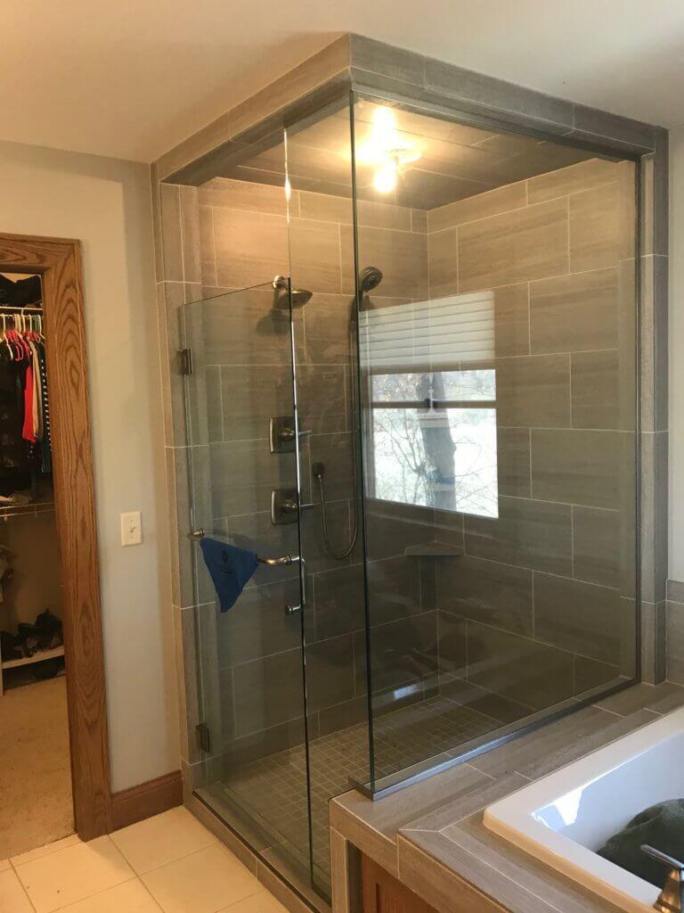 Glass shower enclosure