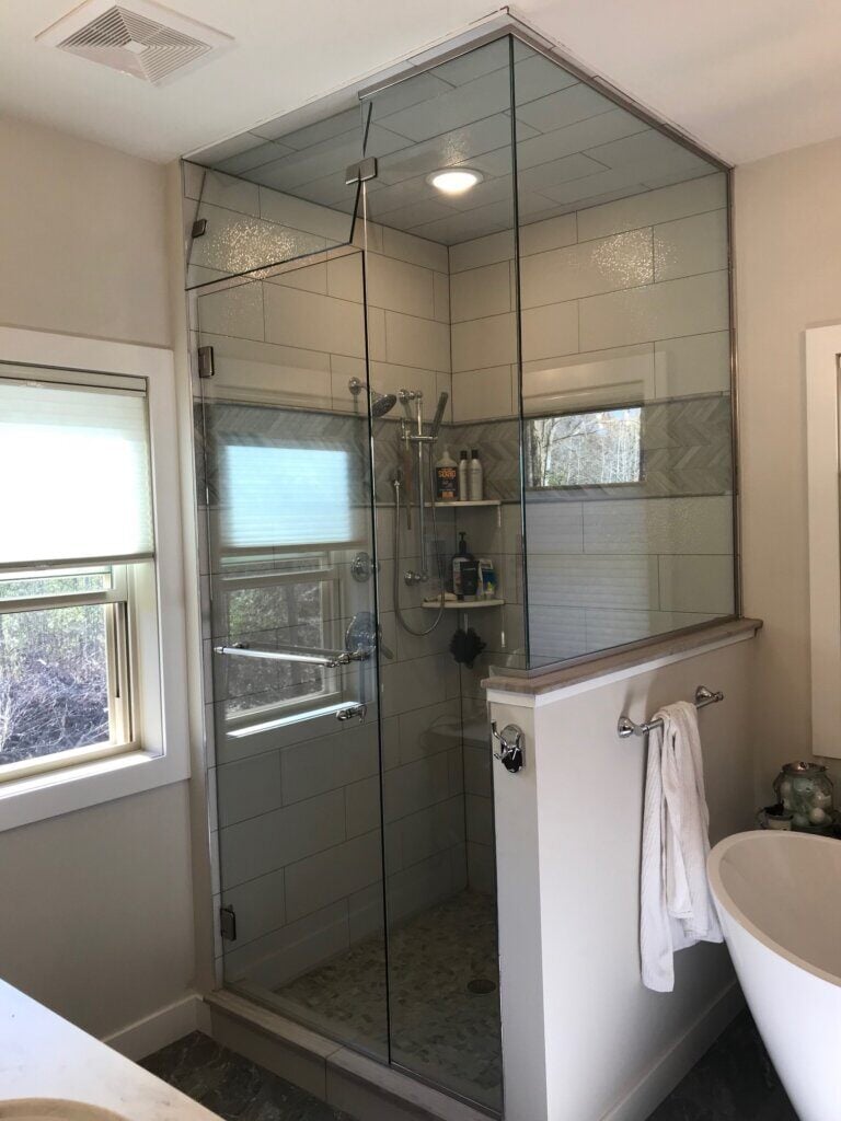 Glass shower enclosure