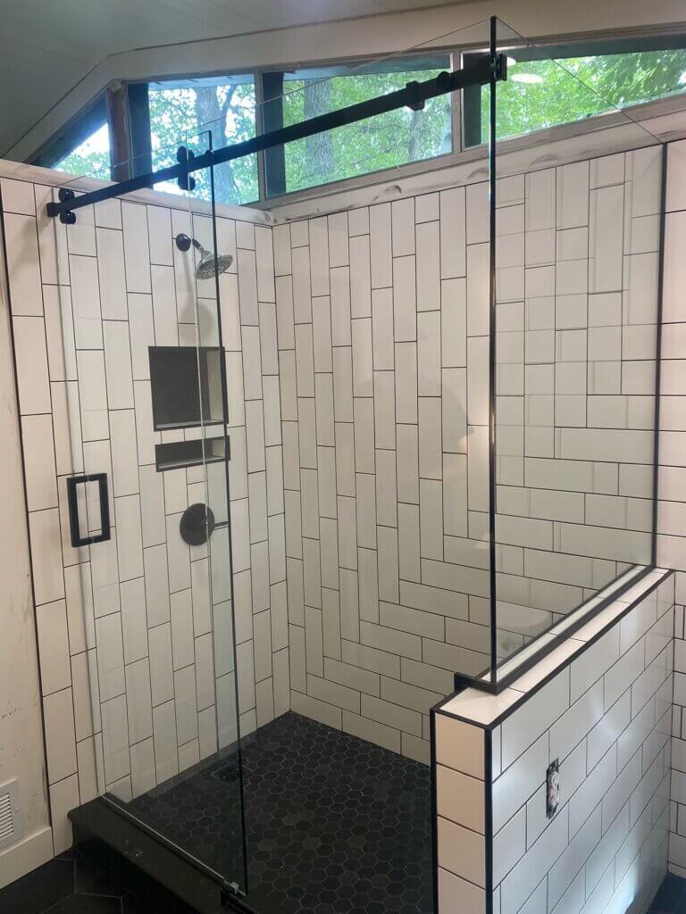 Glass shower enclosure