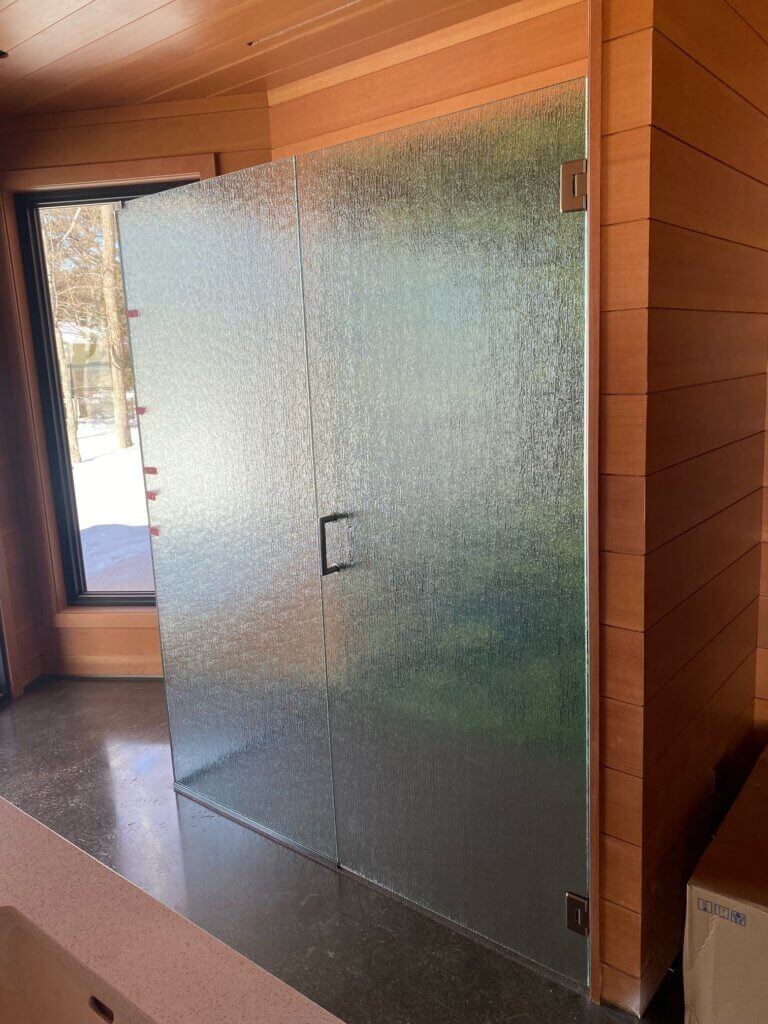 Patterned glass shower