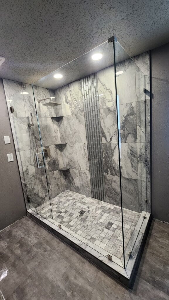 Glass shower enclosure