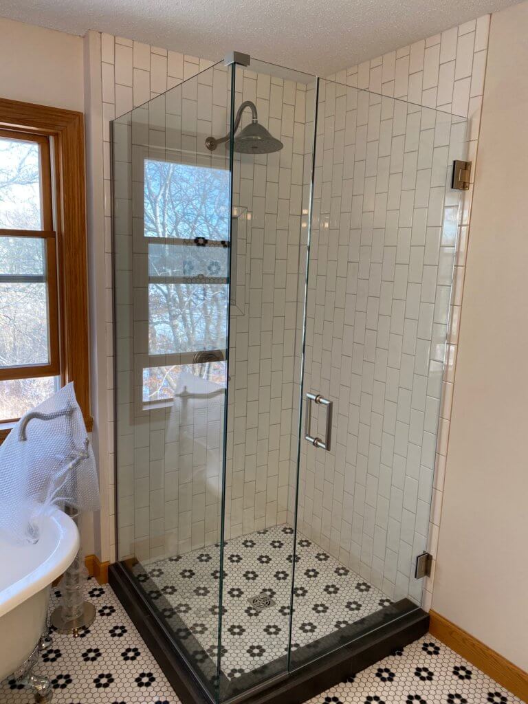 Glass shower enclosure
