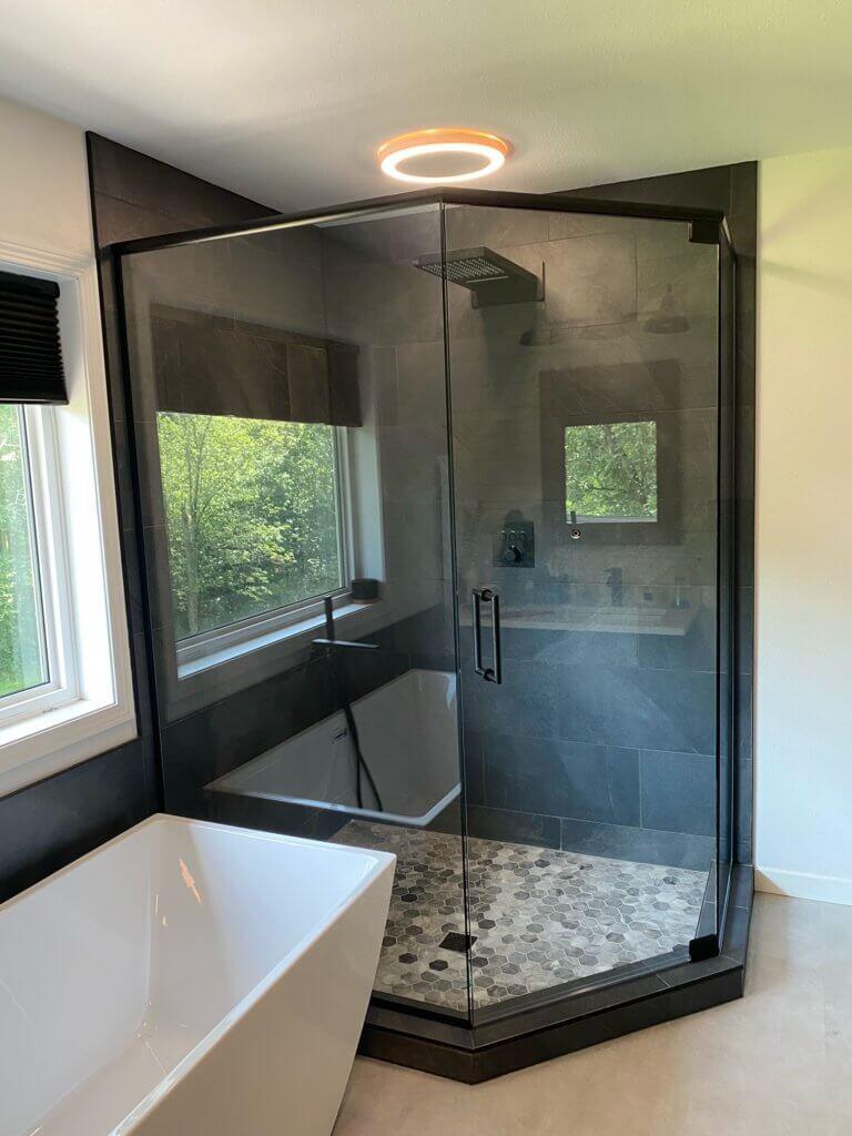 Glass shower enclosure
