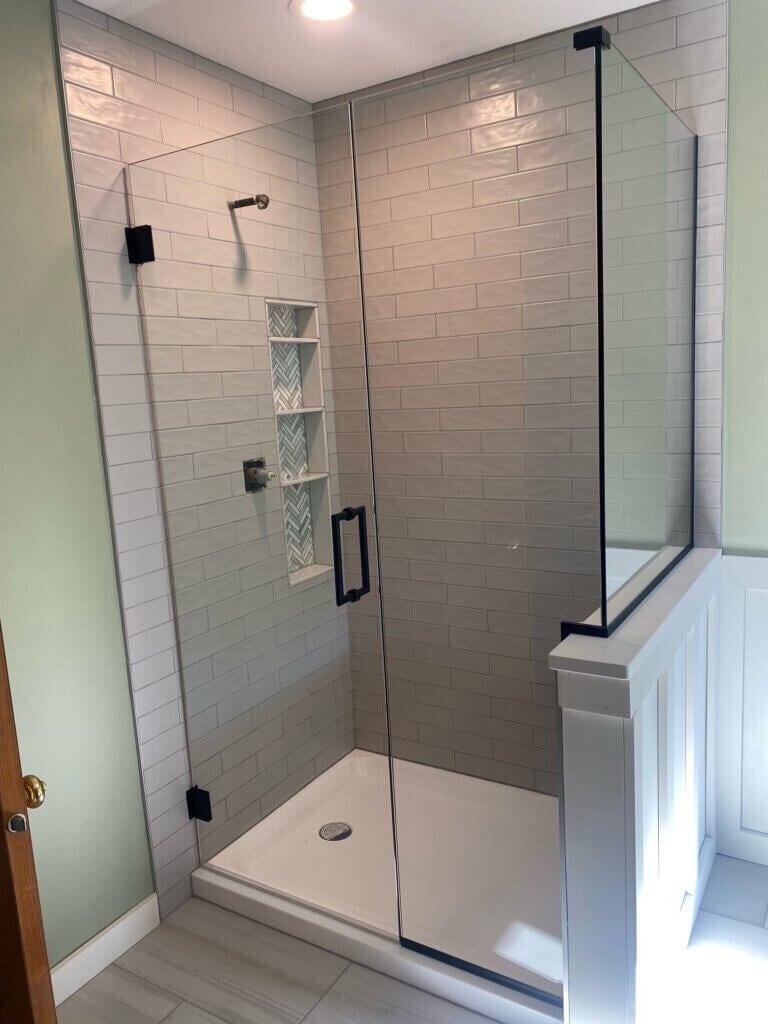 Glass shower enclosure
