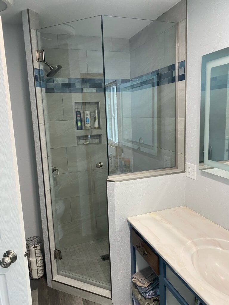 Glass shower enclosure