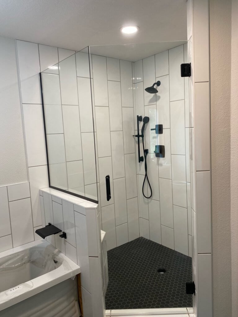Glass shower enclosure
