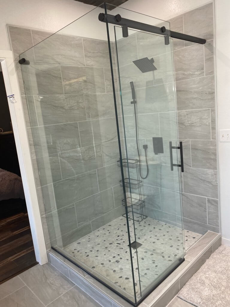 Glass shower enclosure