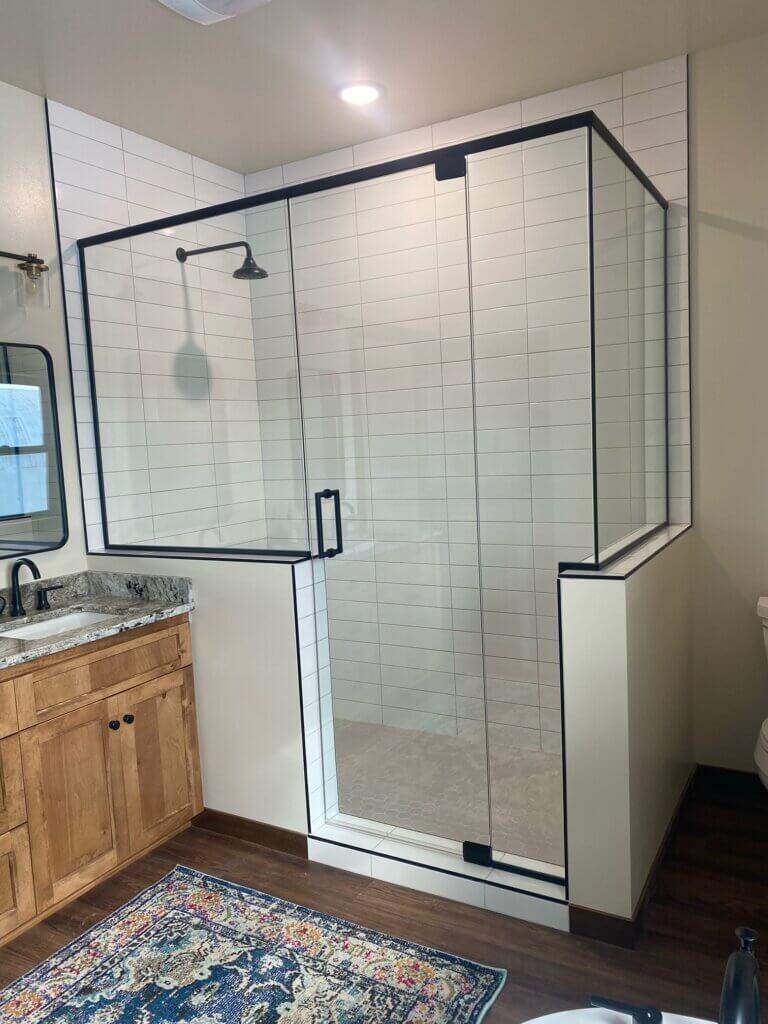 Glass shower enclosure