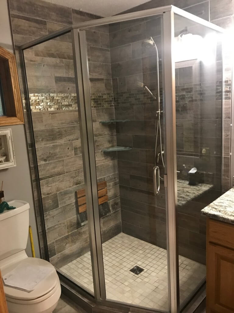 Glass shower enclosure