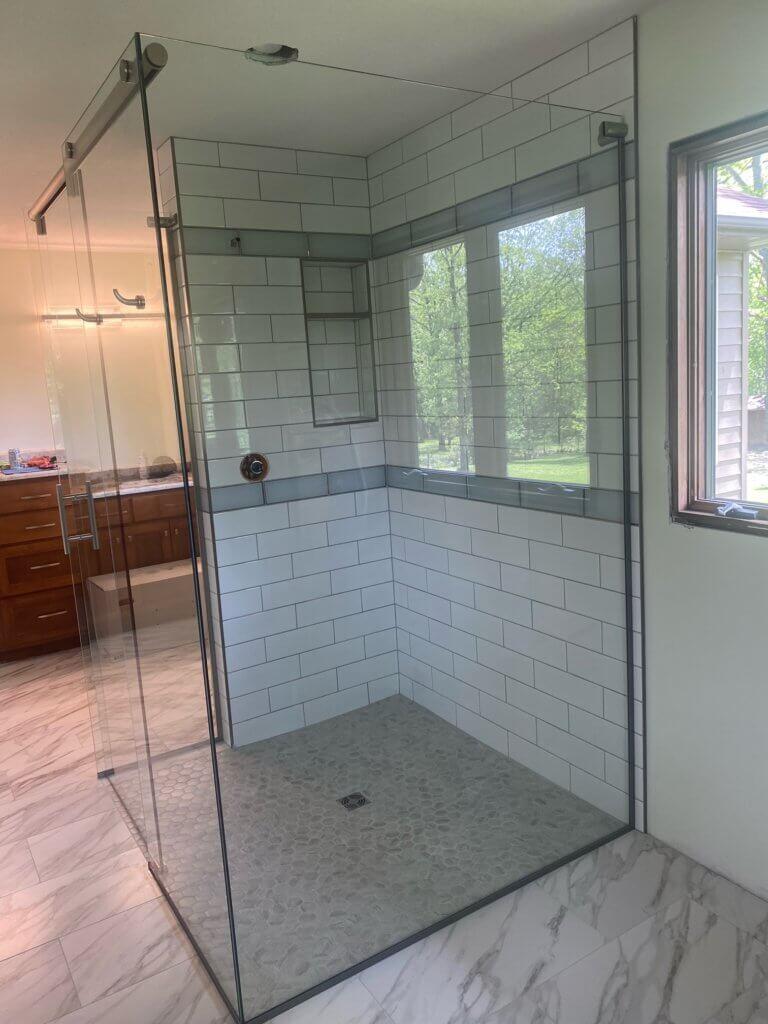 Glass shower enclosure