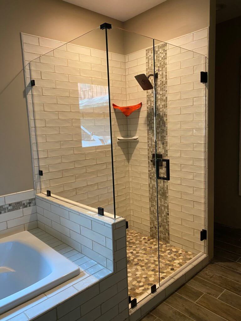 Glass shower enclosure