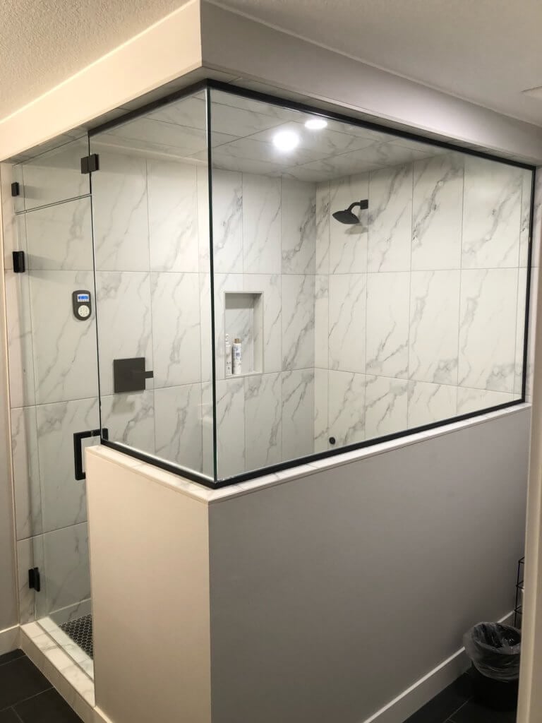 Glass shower enclosure