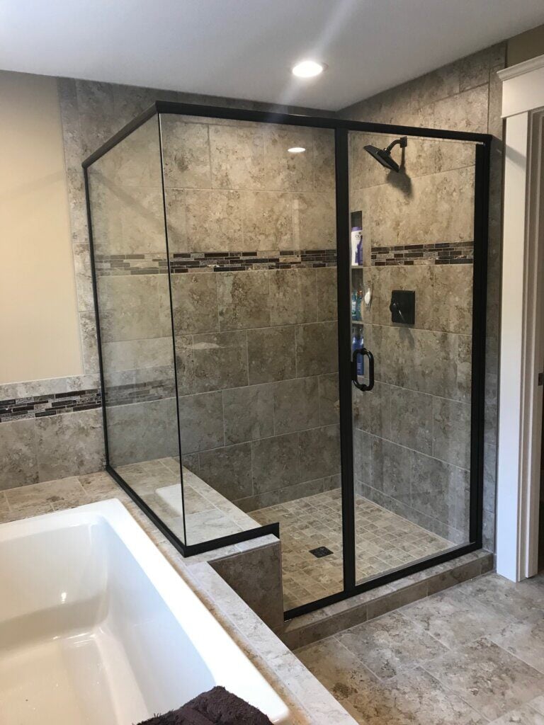 Glass shower enclosure