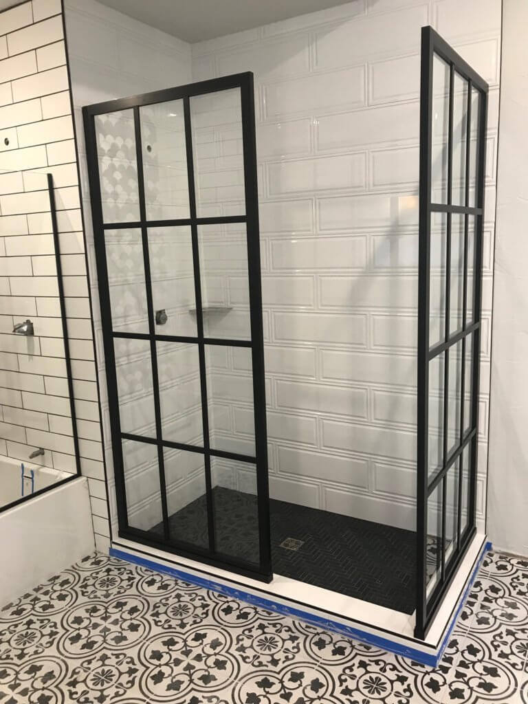 Glass shower enclosure