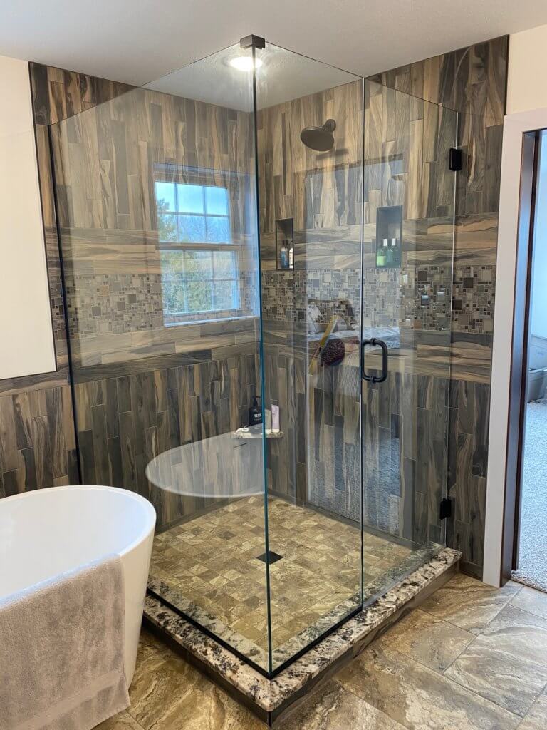 Glass shower enclosure