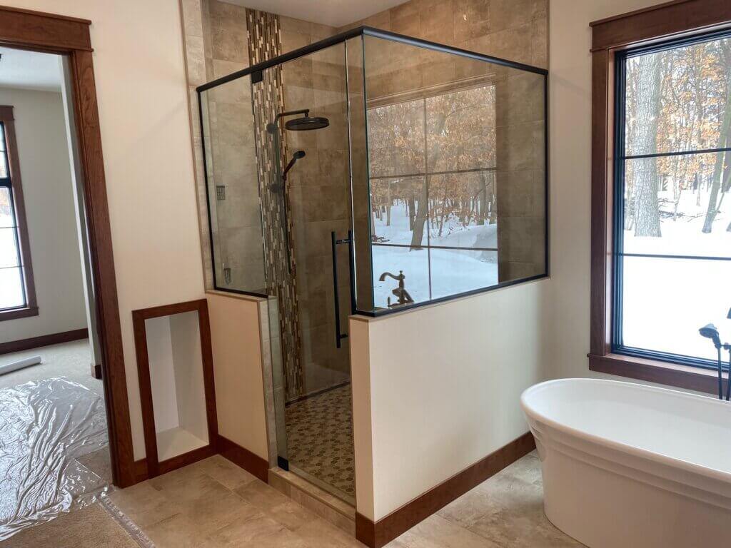 Glass shower enclosure
