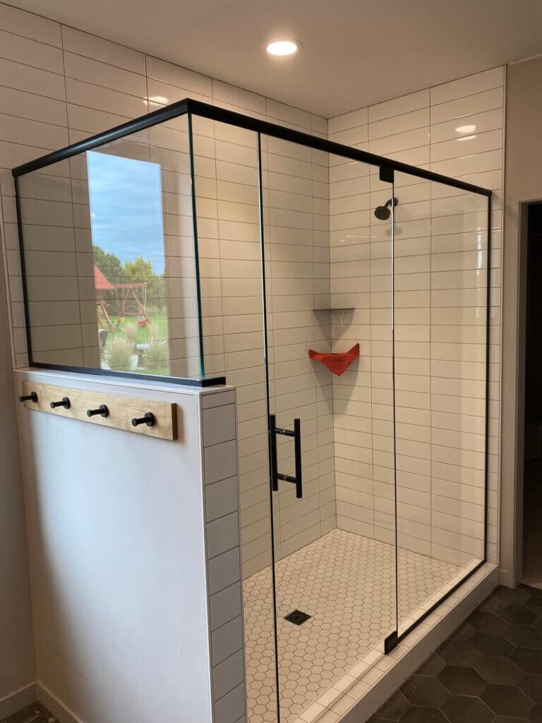 Glass shower enclosure