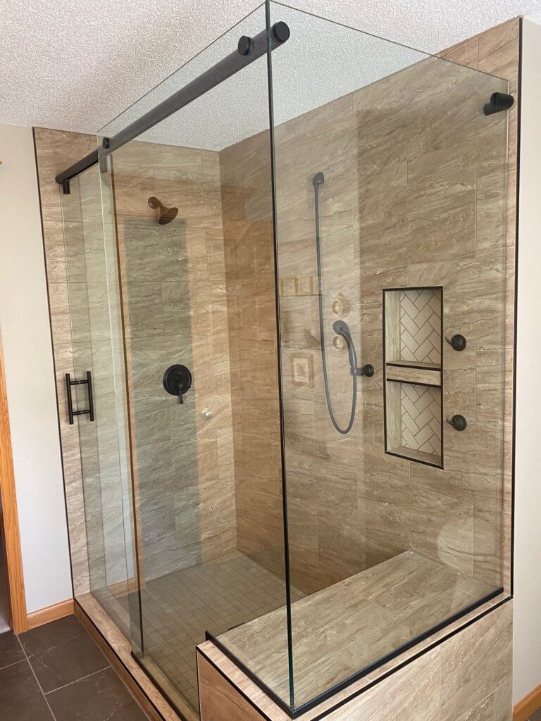 Glass shower enclosure