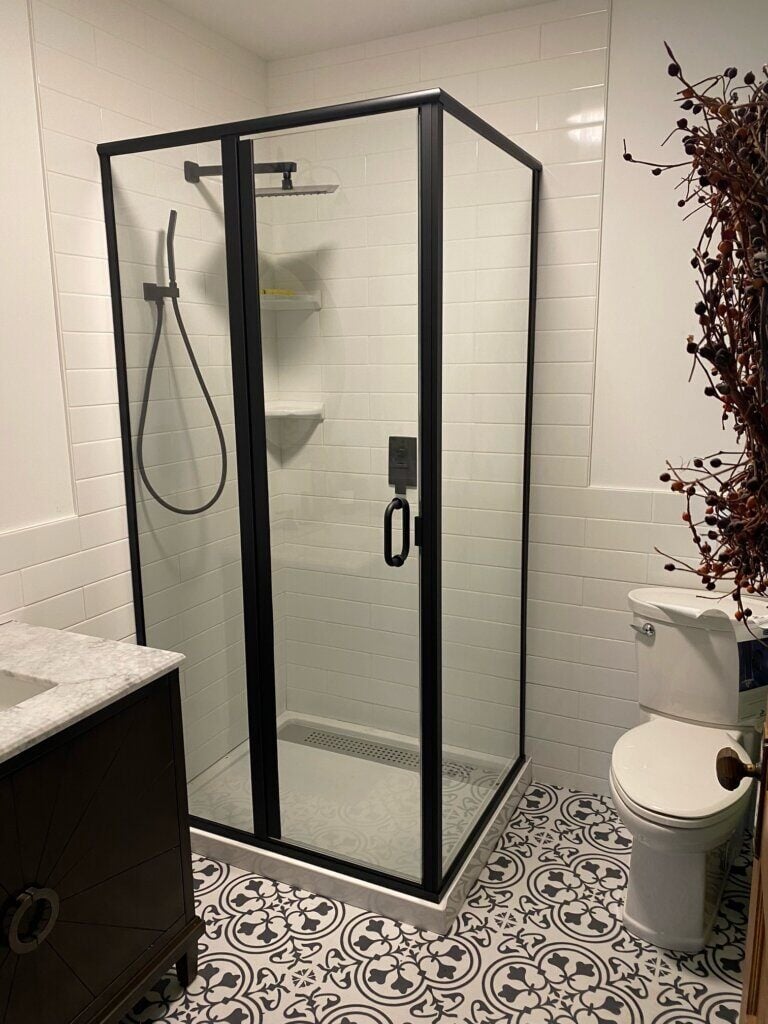Glass shower enclosure