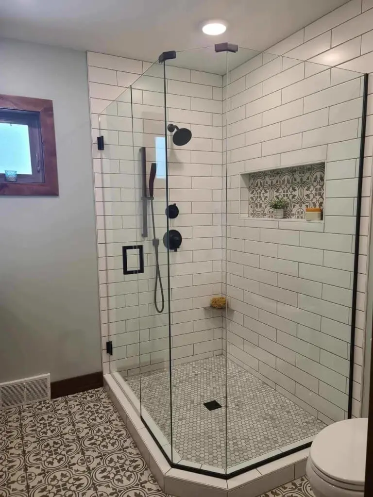 Glass shower enclosure